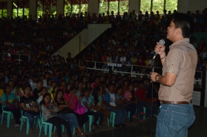 Rep. Law Fortun delivering his message to the student-beneficiaries
